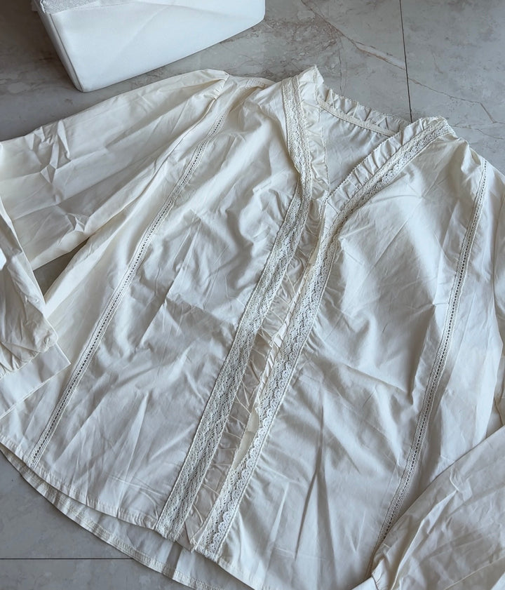 Bonita frill neck blouse